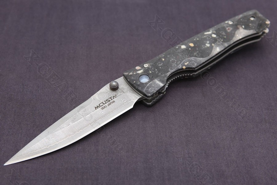 Mcusta Tactility Elite Damascus Black Corian 