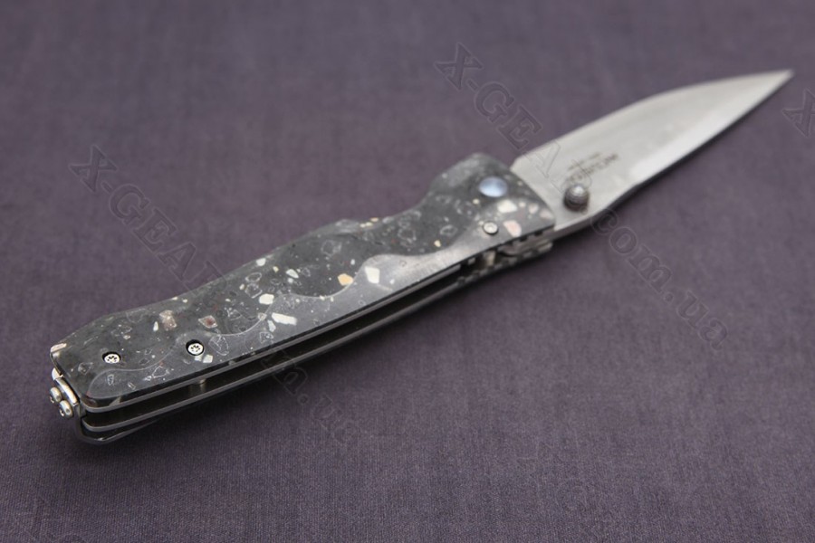 Mcusta Tactility Elite Damascus Black Corian 