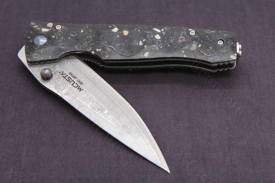 Mcusta Tactility Elite Damascus Black Corian 