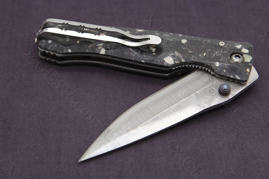 Mcusta Tactility Elite Damascus Black Corian 