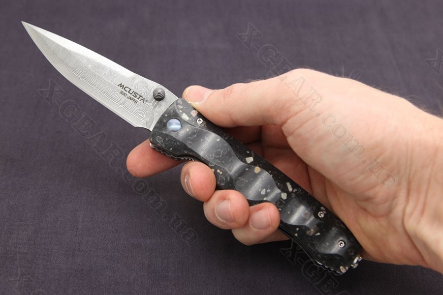 Mcusta Tactility Elite Damascus Black Corian 